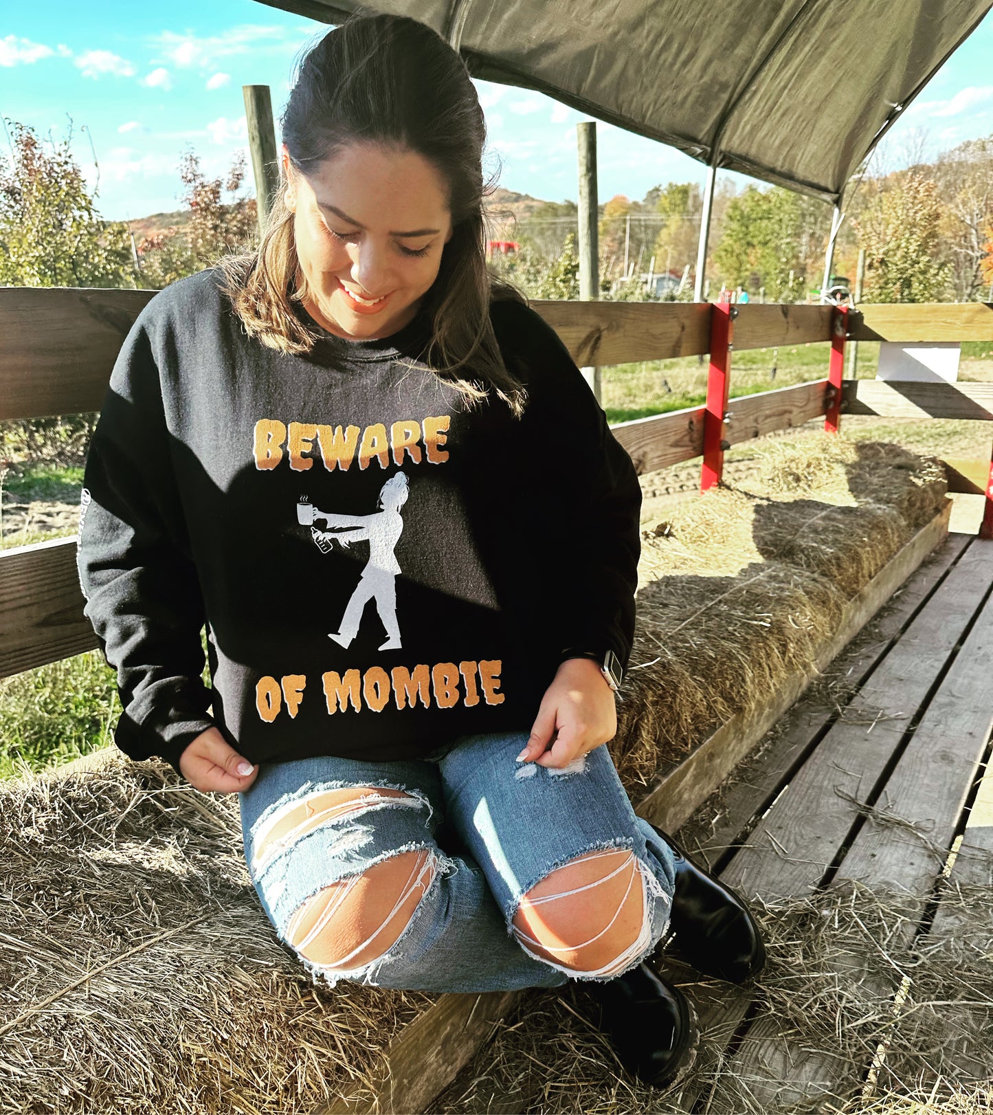 BEWARE OF MOMBIE HOLDING BOTTLE SWEATSHIRT (Unisex)